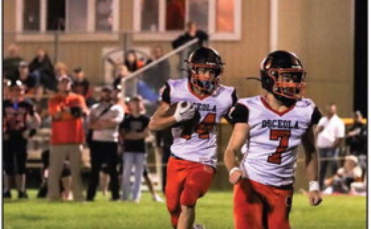 Brycen Kula carries the ball while Matt DeMers leads blocking. PCN photo by Blaine Winslow.