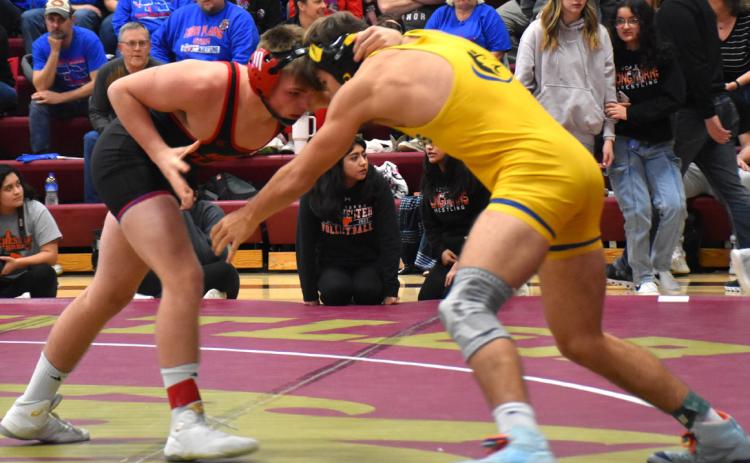 Wyatt Urkoski (left, HPC) and Landon Sliva (right, SRC) look for the takedown at CRC wrestling. Urkoski came in first with Sliva in second. PCN photo by Beth Sparrow.