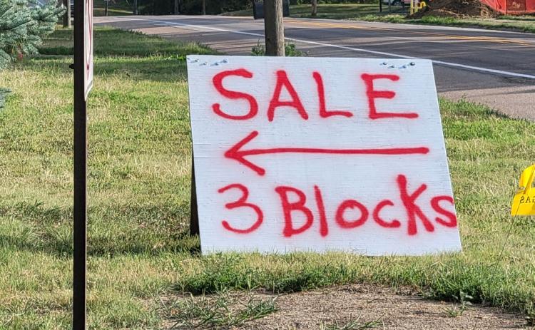 Signs like these will pop up on towns around the county for Bargains for You on 92 shopping this weekend. PCN file photo by Beth Sparrow.