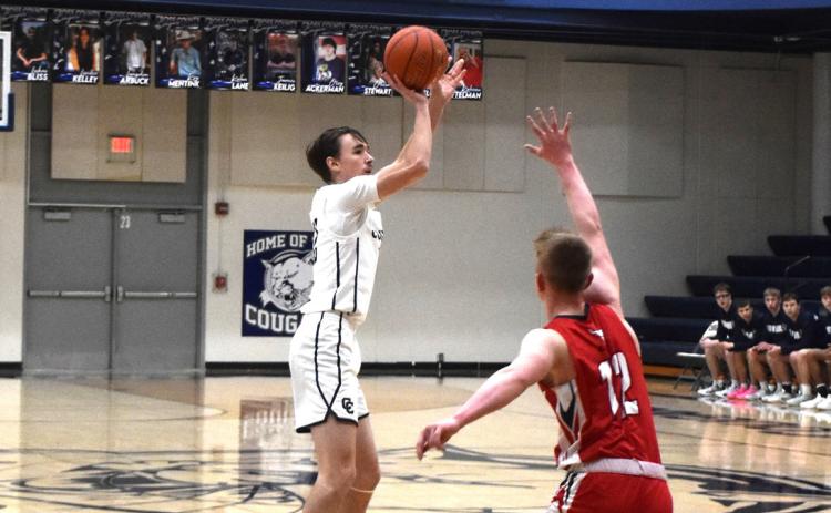 Thatcher Hanson goes for three. PCN file photo by Beth Sparrow.
