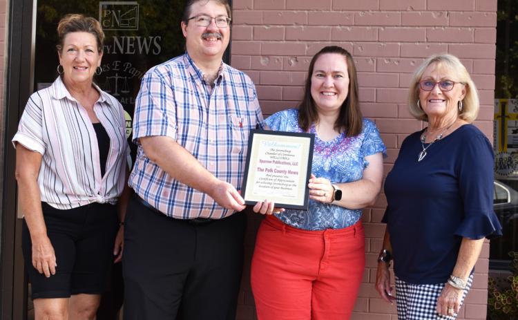 Sparrow Publications, LLC, who are the new publishers of the Polk County News, were welcomed to Stromburg by the Chamber. Pictured are Sherry Oberg, Alan Sparrow, Beth Sparrow and Cinda Koinzan. Alan has lived in Stromsburg over 20 years, and Beth over 15 years, so they know the community. Beth has previously worked in publishing at Cookbooks by Morris Press, as a dental secretary for Bryan Dickey, DDS and digitizing at the courthouse before coming to PCN.