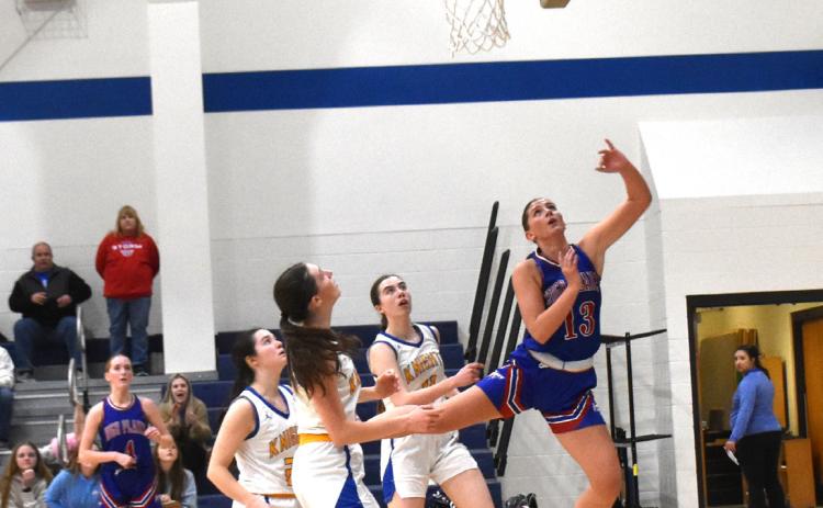 Courtney Carlstrom shoots one up against Nebraska Lutheran. She finished with 10 points in this game. PCN photo by Beth Sparrow.
