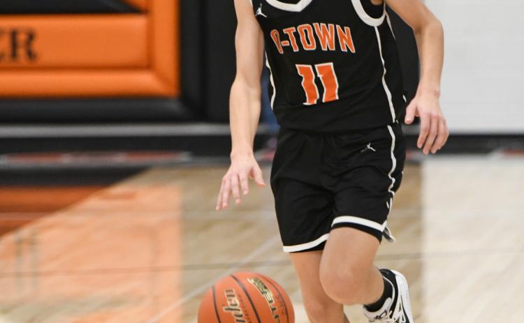 Kelby Neujahr scored 10 points in Osceola's opening GICC Holiday Tournament win against Sutton. He added 8 points against Central Catholic. PCN file photo by Rick Holtz