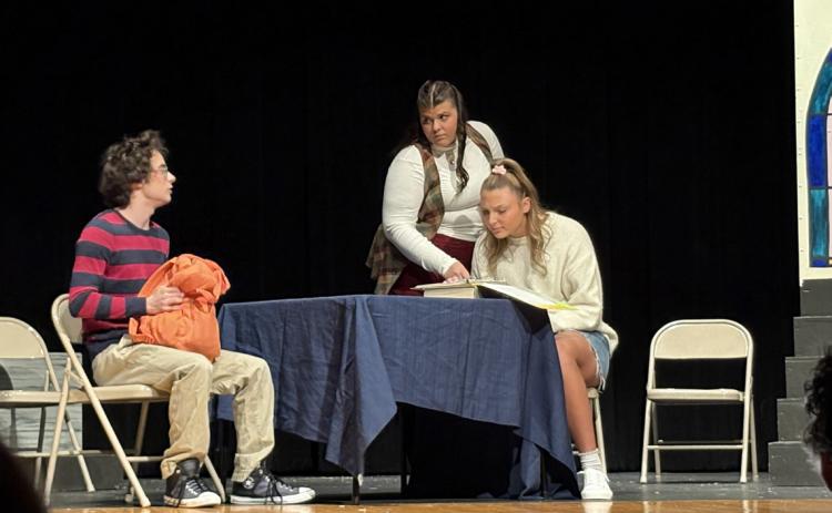 Osceola one act performs “The Best Christmas Pageant” at Cross County last week. Pictured are Jackson Beard as Charlie, Josie Sunday as Mrs. Warren and Graci Conkling as Beth. PCN file photo by Beth Sparrow.