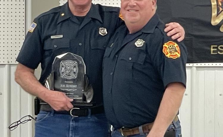 Joe Sunday was honored over the weekend for 45 years of service to Osceola Fire and Rescue. He is pictured (left) with Asst. Chief Andy Roberts. Photo provided.