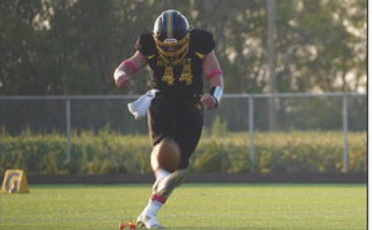 Eli Fjell kicks off for SRC. PCN photo by Jen Vrbka.