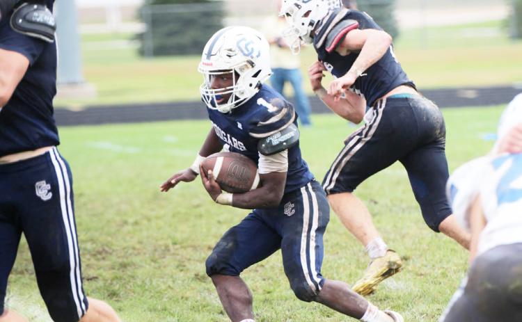 Cross County senior Tyion Francis picks his running lane during Saturday afternoon’s conclusion of the Ravenna at Cross County HC football game. PCN photo by Travis Lane.