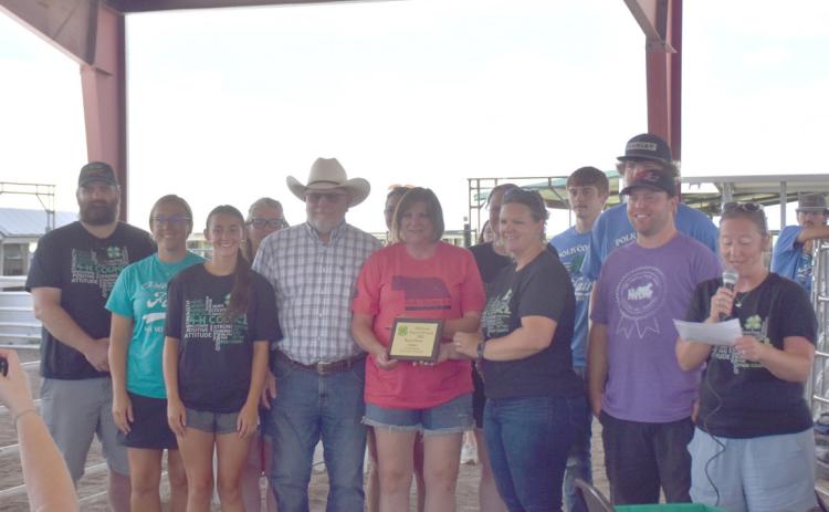 Above: The Heart of 4-H was awarded to Ron and Susan Leimser by the Council. Below: The Heart of 4-H was awarded to the Midwest Covenant Home, represented by Cindy Jensen. PCN photos by Beth Sparrow.