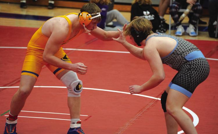 Coy Vrbka (SRC) looks for a way to take down Brabec (Elkhorn North) at the Platteview Invite. PCN photo by Jen Vrbka.