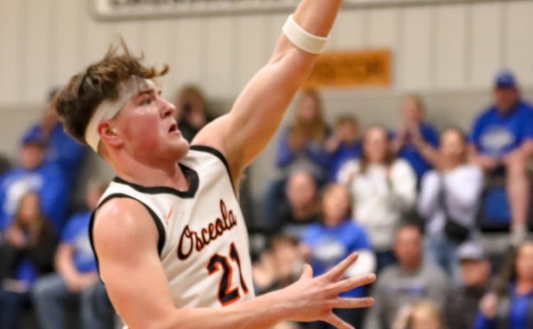 Senior Kale Gustafson goes up for the shot against HSF. PCN photo by Blaine Winslow.