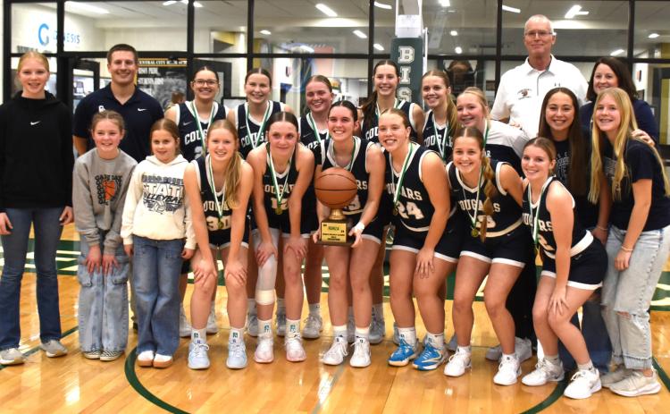 Above: Cross County girls won their 3rd consecutive Runza Holiday championship. Pictured are (front, left to right) Savannah Quilhot, Scarlet Peterson, Kelsey Brehm, Bricelynn Larson, Lindee Kelley, Chesney Sundberg, Olive Peterson, Delainey Cramer; (second row) Rylen Allen, Coach Boshart, Cortina Donnelly, Ella Clark, Ema Dickey, Adrienne Waller, Edie Peterson, Hadley Larson, Coach Allison, Chloe Johnston, Coach Nielsen and Cortlyn Sundberg. PCN photos by Beth Sparrow.