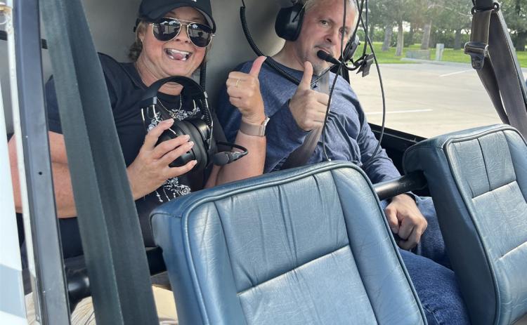 Steve Duranchinsky (right) and a family member prepare to go on a helicopter ride this past Sunday from the Midwest Covenant Home. Photo was provided.