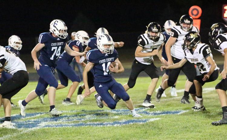 Cole Redden breaks a 29-yard run, his only carry on the night, to move the chains for the Cougars. PCN photo by Travis Lane
