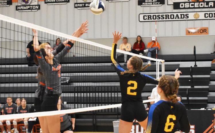 Shelby-Rising City’s Liberty Baker (No. 2) tips the ball over the net against Osceola on Saturday at the Osceola Invite. PCN photo by Beth Sparrow