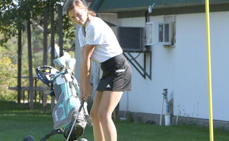 Lillian Wetjen readies her putt on Monday at Ryan Hill Country Club in Osceola. Wetjen shot a career best last week at the Lakeview Invite at Quail Run. PCN photo by Rick Holtz