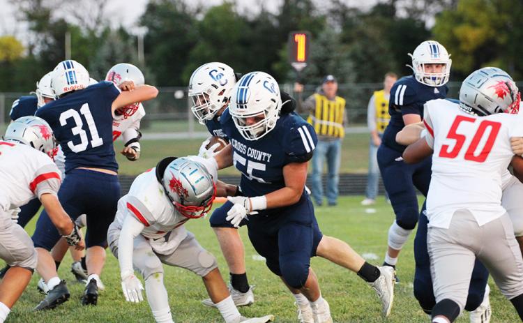 Alex Noyd opens a hole for the offense to run through. PCN photo by Travis Lane