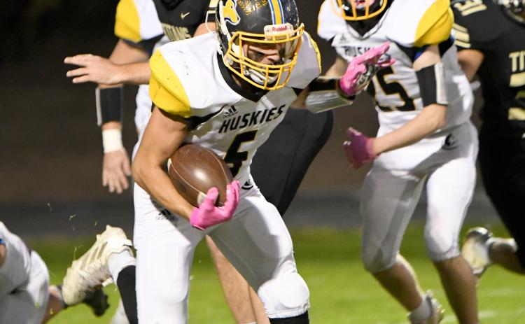 Justin Knoll led the Huskies with 65 yards on 10 carries. The senior also caught one pass. PCN photo by Rick Holtz