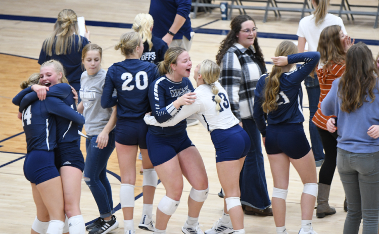 Cross County celebrates after completing the fifth-set comeback in the Subdistrict C2-7 Final. PCN photo by Rick Holtz
