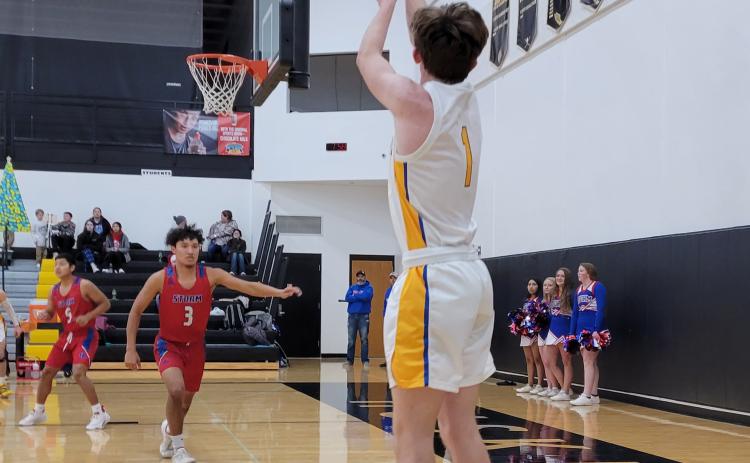 Gabe Dutton-Mofford takes a shot. Mario Lesiak waits for the rebound.