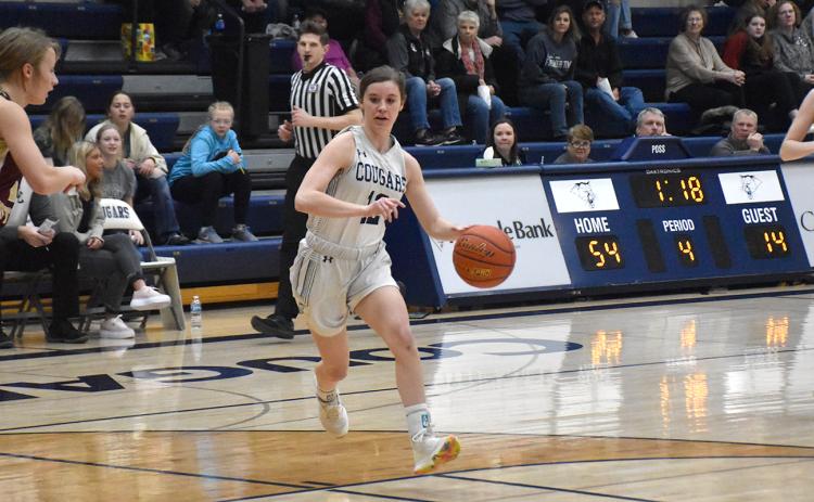 Addie Linn pushes the ball up court for the Cougars. PCN photo by Beth Sparrow