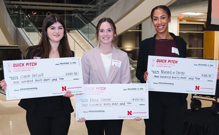 Alexa Carter (center) won a prize in the Quick Pitch competition at UNL.