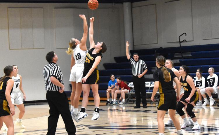 Lilly Peterson gets the jump shot to start the game.