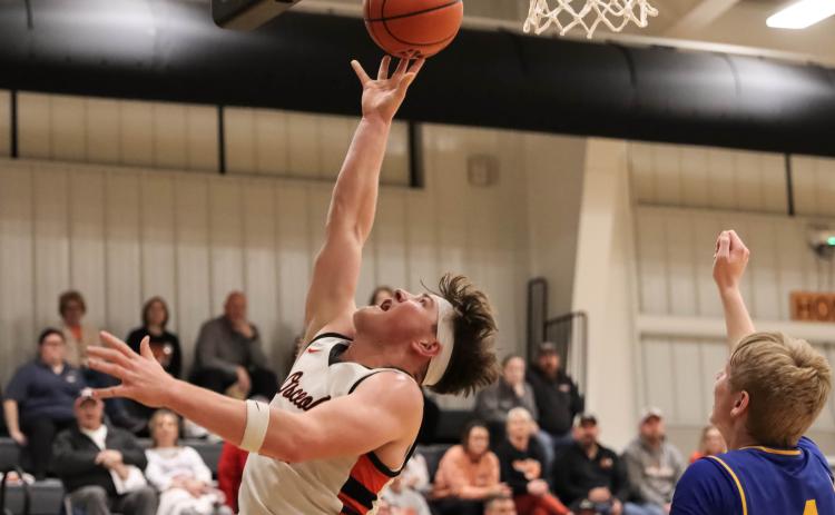 Kale Gustafson going up for a shot. PCN file photo by Blaine Winslow.