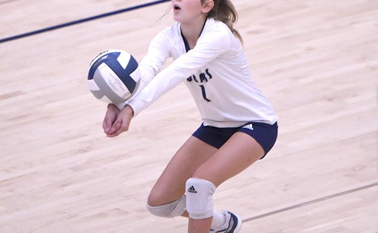 Ella Cramer gets a serve receive in the Cross County game against Fullerton. PCN photo by Rick Holtz.