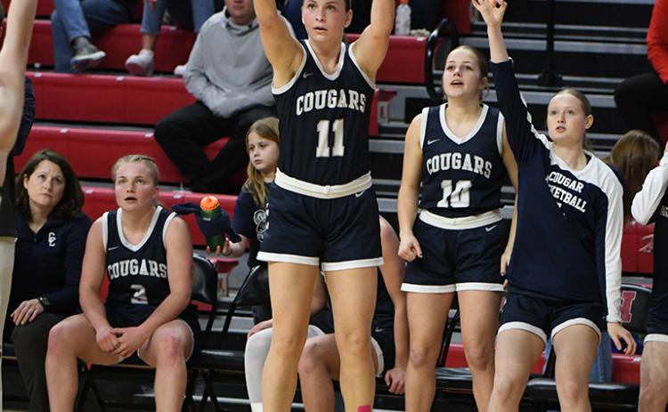 Ella Clark shoots a three; she made three of them in the game. PCN photos by Rick Holtz