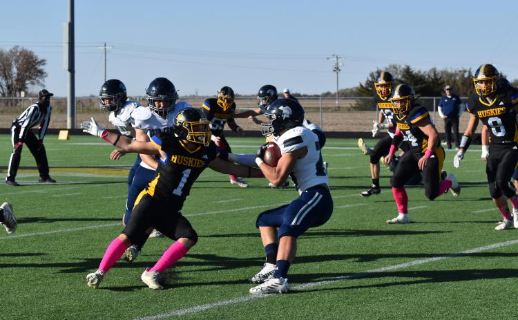 Owen Krafka tries to take down a Spartan