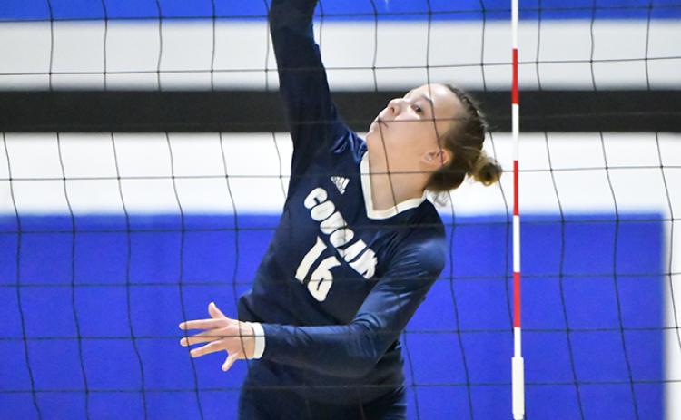 Ava Pruter gets a kill at the Twin River triangular. PCN photo by Rick Holtz