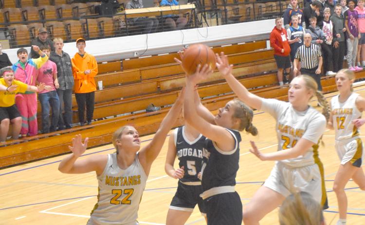 Olive Peterson goes up for a shot.
