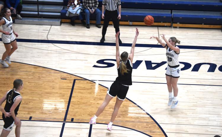 Kelsey Brehm goes for 3. PCN photo by Kirk Sparrow