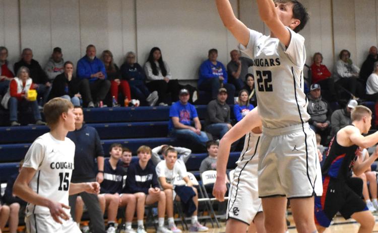 Kole Crawford grabs a rebound. PCN file photo by Beth Sparrow.