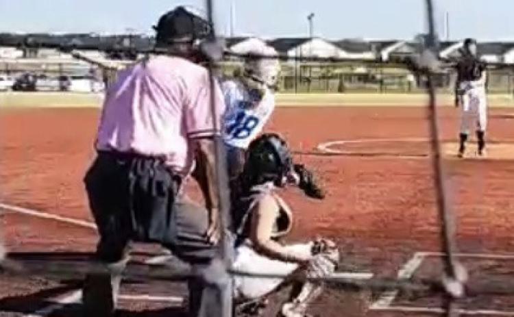 Madysen Berggren (#18) triples in the championship game. Photo provided.