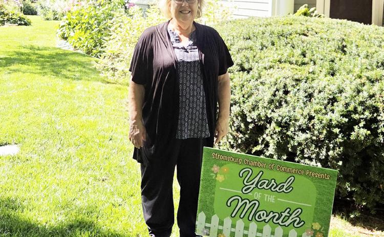 Helen Werth is the August winner of the Yard of the Month. Shortly after Jerry’s passing last year, Helen came home to their yard completely destroyed by army worms. With the help of Negley’s Complete Lawn Care her yard was brought back to life! Helen’s yard is also surrounded by the most beautiful flower garden. Each variety of flower in her garden seems to have a story with it. Helen’s Grandson Ian helps her keep it tidy by mowing. Congrats to Helen! Photo was provided.