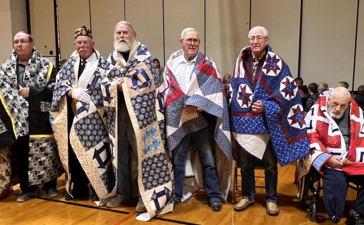 Osceola recipients of the Quilts of Valor included Ron Girard, Dave Ienn, Steve Johnson, Gary Mentink, Francis Eugene Bartak, and Steve Hendrickson. PCN photo by Cienna Friesen.