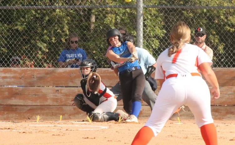 Blue River sophomore Ashlyn Long blasts a two-run first inning home run against Lexington. The Panthers defeated the Minutemaids 12-0, but saw their season end with a 6-0 loss to Elkhorn. PCN photo by Ken Kush.