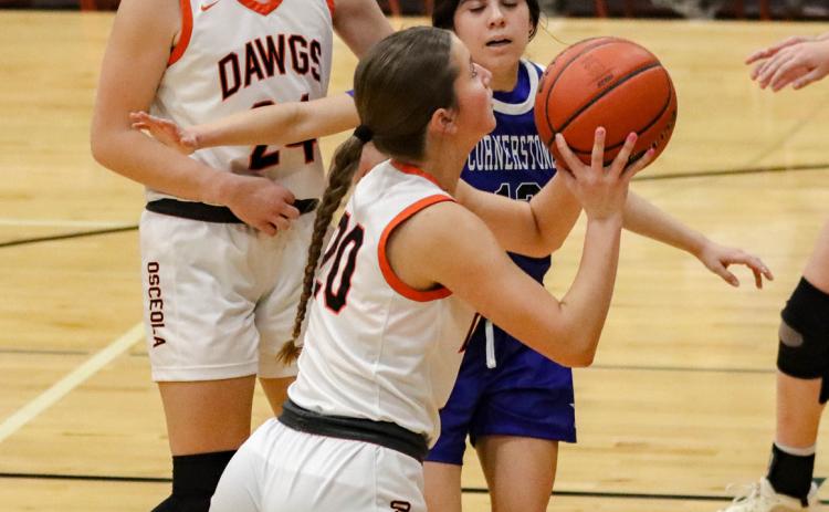 Halle Gabel takes a shot with Bella Recker in the background. PCN photo by Blaine Winslow.