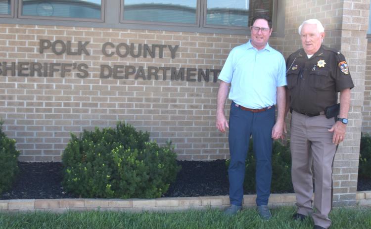 Above: Congressman Flood visited with Polk County Sheriff, Dwaine Ladwig. PCN photo by Beth Sparrow.