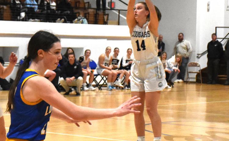 Shyanne Anderson takes a shot at conference. PCN file photo by Beth Sparrow.