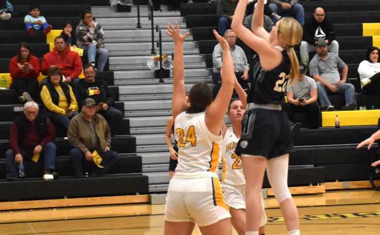 Above: Bricelynn Larson (CC) takes a shot against Rylie Carter (SRC) on defense. PCN photo by Beth Sparrow.
