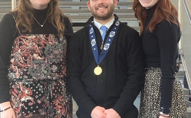 Matt DeMers (of Osceola) was selected by the NSAA for his entertainment speech as “the best of the best”. Pictured with him are his coaches Payton DeMers-Sahling (left) and Abby Olson. Photo provided.