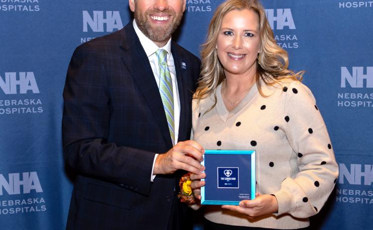 Above: Heather Roberts of Osceola (right) received the Caring Kind award at the Nebraska Hospital conference. Photo provided.