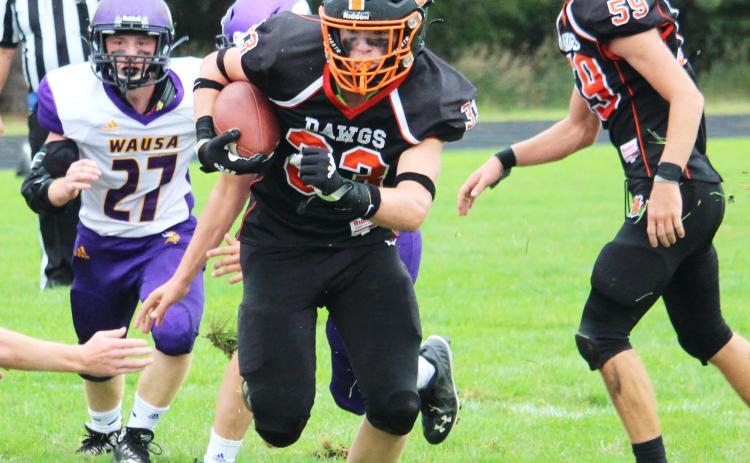 Kale Gustafson rushed for 120 yards and three touchdowns in a 52-50 win over Wausa last season for the Bulldogs. Polk County News File Photo