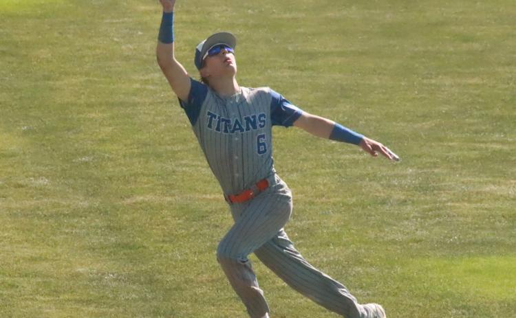 Twin River centerfielder Braxtin Fowler covered a lot of ground trying to run down this long fly ball off th e bat of Lincoln Christian’s Grant Dehaan. The ball would clear the fence by a couple of feet for a 3-run home run in the fourth. PCN photo by Ken Kush.