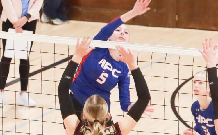 High Plains sophomore Brooklynn Welch (5) scores the kill over the East Butler defense in opening round action of the CRC in York. PCN photo by Ken Kush.