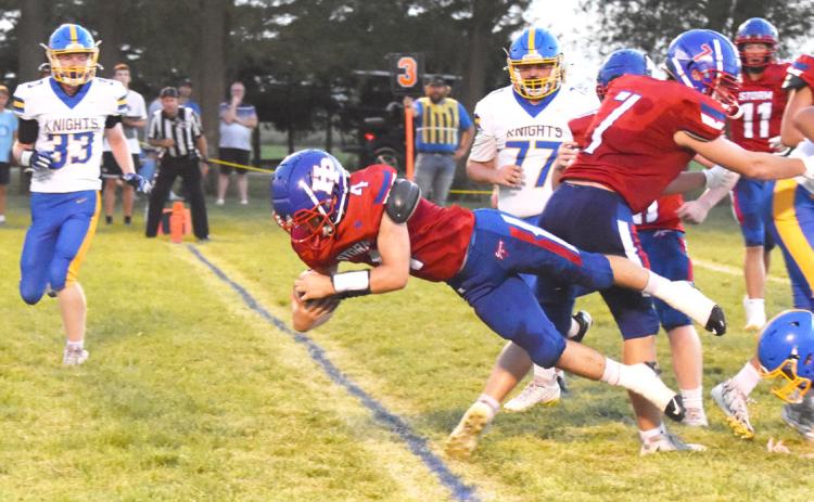 High Plains senior Aaron Brown keeps his feet long enough to dive over the goal line for six points in the Storm’s 62-0 win over Nebraska Lutheran this past Friday night. PCN photo by Beth Sparrow.