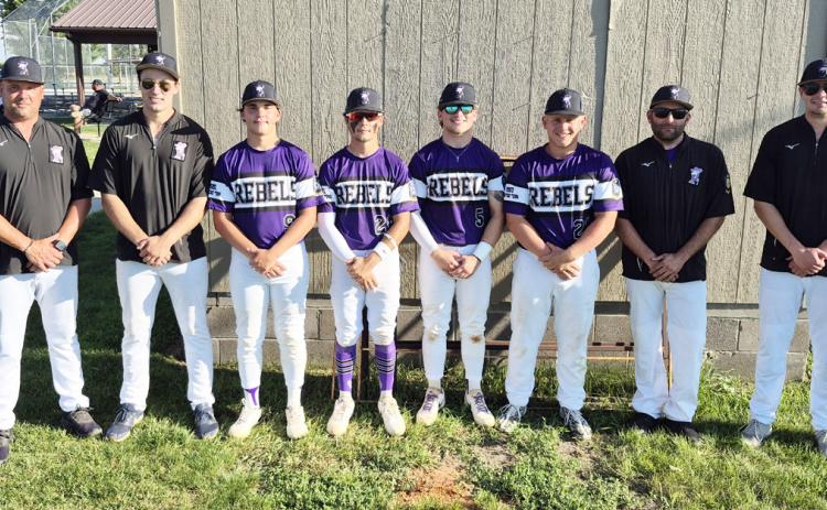 Flanked by coaches to their left and their right, these four players, Owen Krafka, Brayden Santos, Aden Feezell and Eli Fjell were a consistent contributor to the SOS baseball program since they became part of it. PCN photo by Ken Kush.