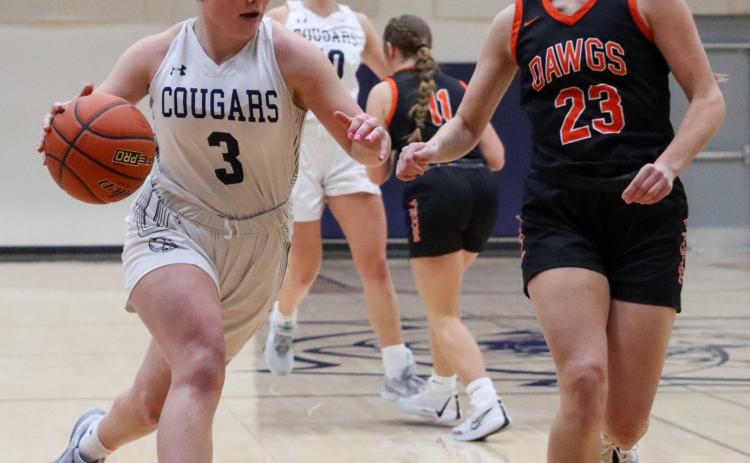 Ema Dickey (CC) takes the ball around Emma Recker (OSC) on Tuesday evening. PCN photo by Blaine Winslow.